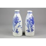Two Early 20th Century Blue and White Japanese Sake Bottles