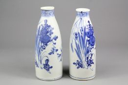 Two Early 20th Century Blue and White Japanese Sake Bottles