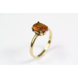 An 18ct Yellow Stone Ring