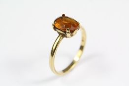 An 18ct Yellow Stone Ring