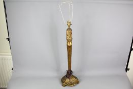 A French Art Nouveau Brass Lamp Stand