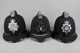 Three Police 'Coxcomb' Helmets