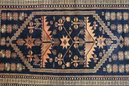 A Wool Navy and Claret Prayer Rug