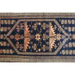 A Wool Navy and Claret Prayer Rug
