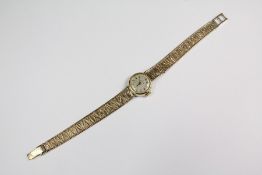 A Lady's 9ct Yellow Gold Omega Wrist Watch