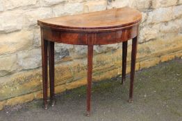 A Mahogany Demi-Lune Table