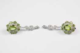 A pair of silver CZ and Tourmaline Drop Earrings