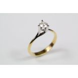 An 18ct Yellow and White Gold Solitaire Diamond Ring