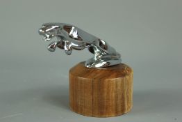 A Silver Metal Jaguar Car Mascot