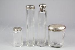 Four Cut Glass Silver Topped Vanity Jars