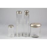 Four Cut Glass Silver Topped Vanity Jars