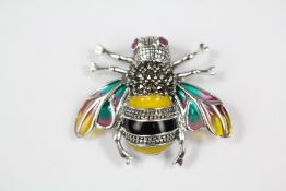 A silver plique a jour brooch