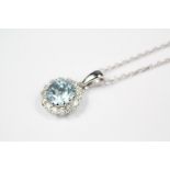 An 18ct White Gold Aquamarine and Diamond Pendant