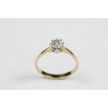 An 18ct Gold and Solitaire Diamond Ring