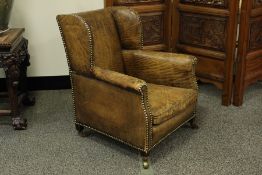 A Childs Leather Wingback Chair