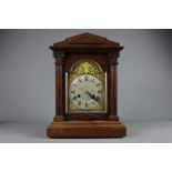 An Oak Cased Mantel Clock