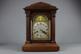 An Oak Cased Mantel Clock