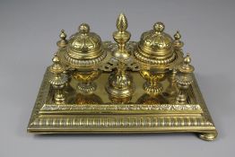 A Victorian Brass Inkwell