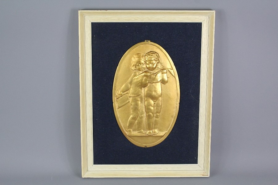 Four Gilt Brass Plaques