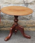 A Circular Tilt-Top Mahogany Table