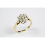 A 18k Yellow Gold Diamond Cluster Ring