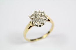 A 18k Yellow Gold Diamond Cluster Ring