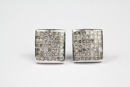 A Pair of White Gold Diamond Earrings