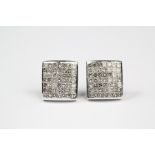 A Pair of White Gold Diamond Earrings