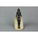 Art Nouveau-style bronzed figurine