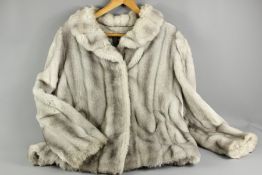 A Lady's Light Grey Faux Fur Jacket