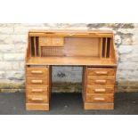 An Oak Roll Top Desk