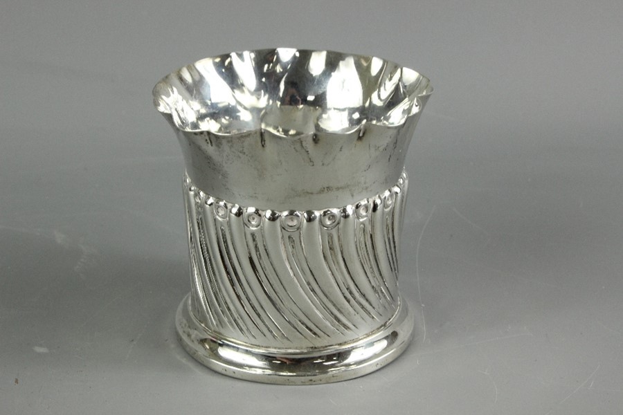 A Silver Beaker/Bottle Coaster