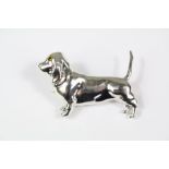 A Silver Dog Brooch