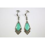 A Pair of Silver and Turquoise Earrings