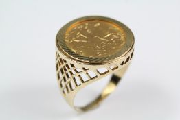 A 9ct Gold Half Sovereign Ring