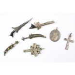 Quantity of Malay Kris & curved Arabic dagger brooches with Coptic Cross Pendant.