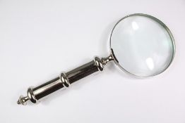A Large Silver Plated Hand Held Magnifying Glass