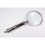 A Large Silver Plated Hand Held Magnifying Glass