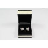 A Pair of Silver and CZ Earrings