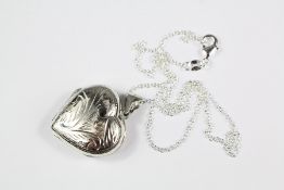 A Silver Heart-Shaped Photo Locket