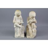 A Pair of Marble Figurines