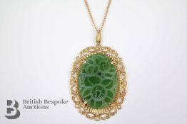 An Oval Jade Pendant