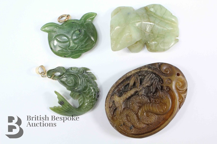 Four Jade Pendants