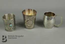 Three White Metal Beakers