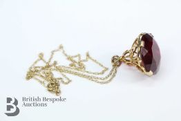 A 9ct Gold and Red Stone Fob