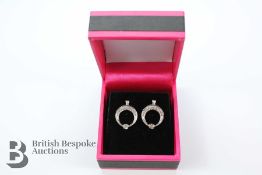 Pair of 18ct White Gold Halo-style Diamond Earrings