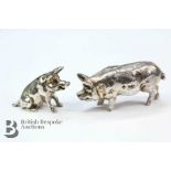 Two Silver Pigs