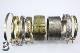 Four Rolled Gold and Silver Bangles