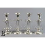 Two Pairs of Lyre-Form Silver Plated Candlesticks