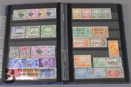 Large box of all-world stamps loose and in albums including some classic era mint Commonwealth